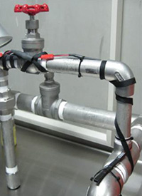 Image of a "Battery-less Water Leak Sensor" Installed